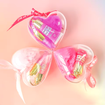 Оптом Набір блисків для губ 2-в-1 з хутряним брелоком GLITTER LIP GLOSS IMAN OF NOBLE - 9 шт./уп.